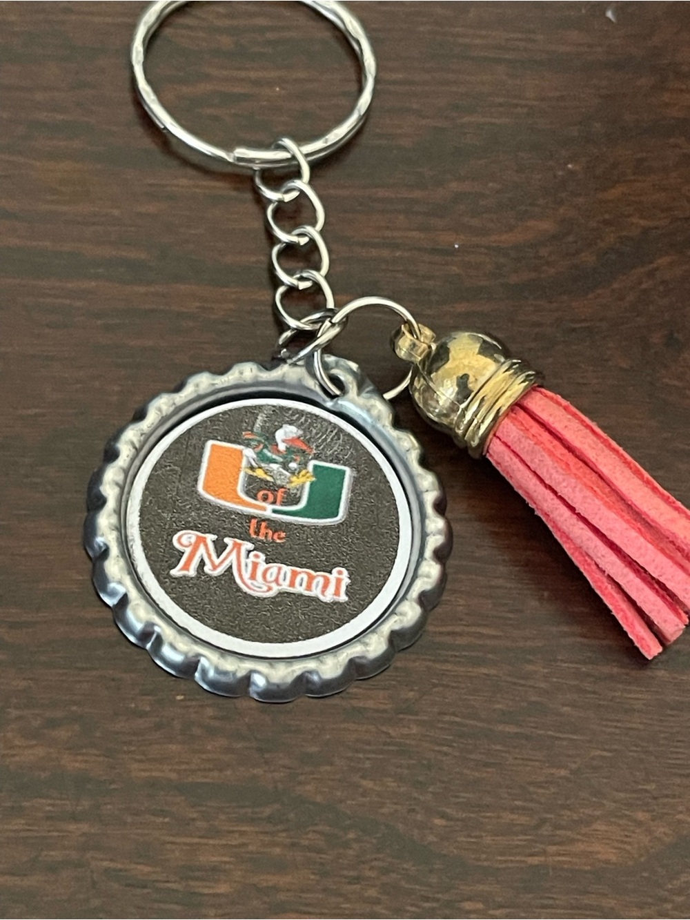 Miami 'The Miami' Logo Bottle Cap Keychain with Coral Tassel